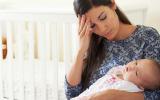 Tired Mother suffering from postpartum depression